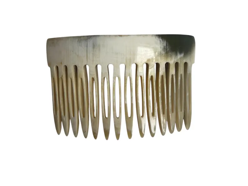 The 3-in-1 Horn Comb: Detangle. Secure. Style